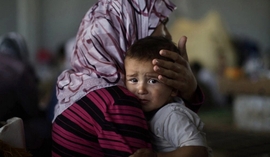 Kazakhstani Women & Children Detained In Syria Return Home